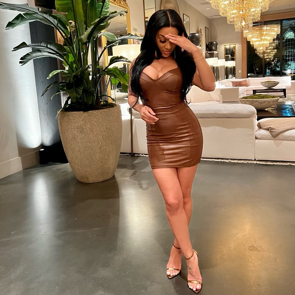 Naked wardrobe leather dress